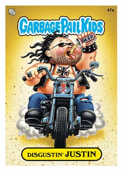 A Garbage Pail Kids trading card labeled '47a' at the top right corner. The card features a cartoon character named 'Disgustin' Justin' depicted as a tough-looking baby with long hair, sunglasses, and a beard, riding a motorcycle. The character is drinking from a can labeled 'BEER' and has tattoos and a skull on the motorcycle. The 'Garbage Pail Kids' logo is at the top of the card, and the name 'Disgustin' Justin' is written on a yellow banner at the bottom. The background is yellow.